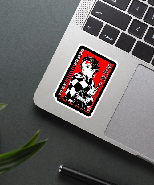 tanjiro kamado demon slayer vinyl sticker on laptop surface showing classic anime hero