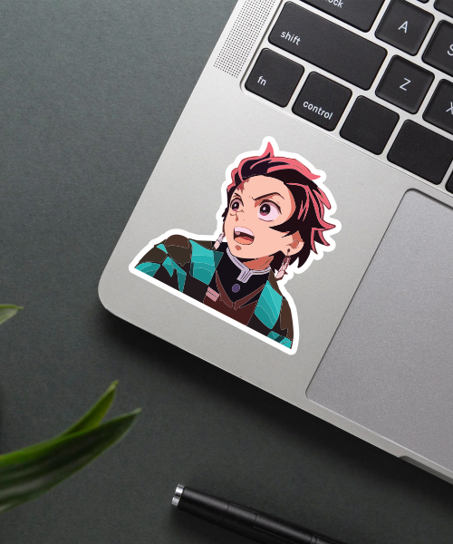 tanjiro kamado demon slayer sticker on laptop surface showing vibrant colors and sharp details